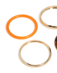 Featuring gold, brown and orange acrylic bangle 4-pack with close up view - link has visual effect only