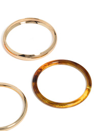 Featuring gold, brown and orange acrylic bangle 4-pack with close up view - link has visual effect only