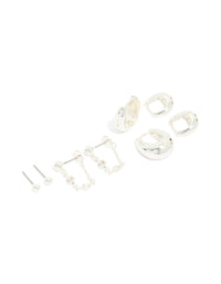 Showcasing a silver plated chain and huggie earrings 4-pack in huggie and stud closures front view - link has visual effect only