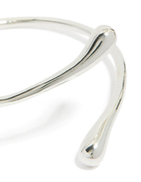 Stunning teardrop wrap around bangle crafted from silver plated material close up view - link has visual effect only