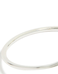 Stunning teardrop wrap around bangle crafted from silver plated material close up view - link has visual effect only