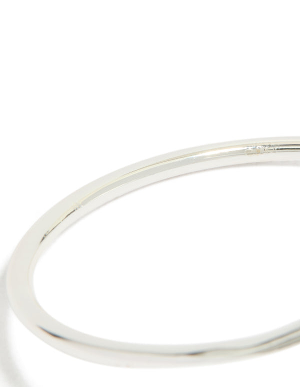 Stunning teardrop wrap around bangle crafted from silver plated material close up view