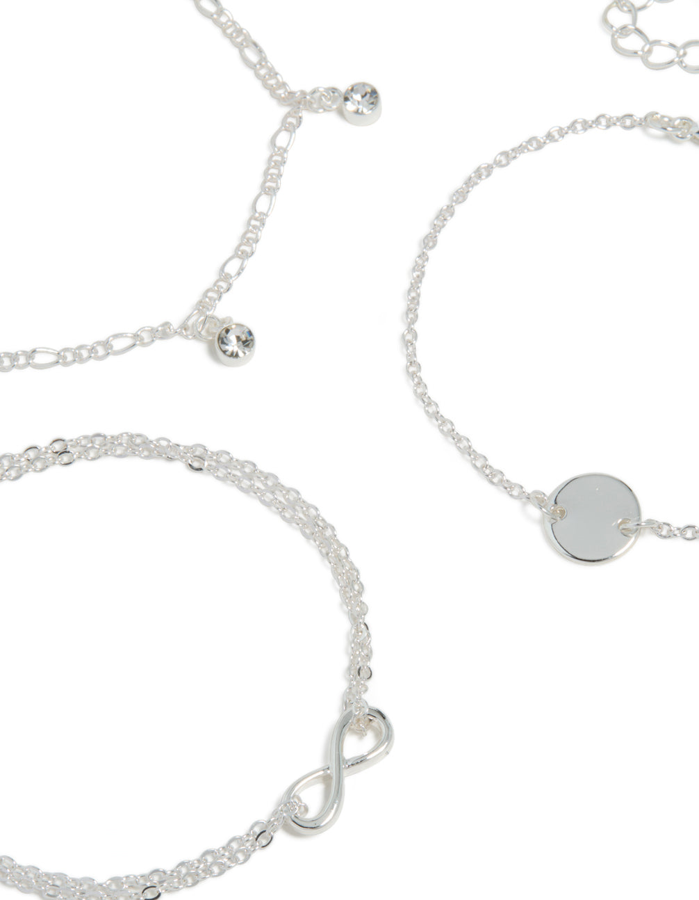 Detailed view of diamante infinity circle bracelet 3-pack with charm accents in silver close up view