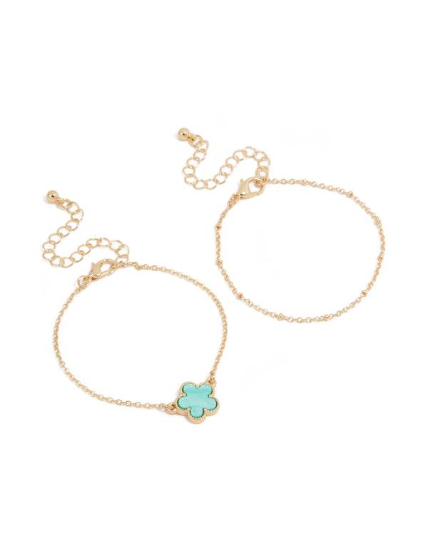 Showcasing a 2-pack of bracelets featuring floral in gold and turquoise front view