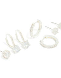 Featuring silver plated cubic zirconia mixed stud and huggie earrings in a 4 pack close up view - link has visual effect only