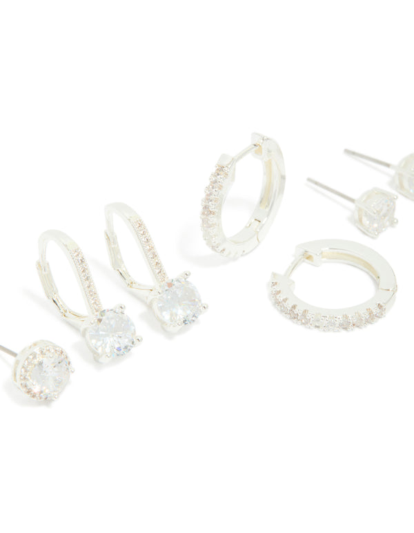 Featuring silver plated cubic zirconia mixed stud and huggie earrings in a 4 pack close up view