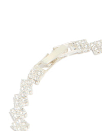 Featuring silver plated cubic zirconia multi flower tennis bracelet with floral pattern closure detail view - link has visual effect only
