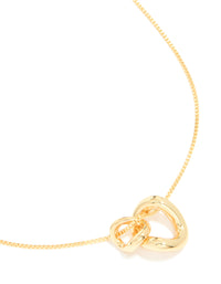Crafted from gold plated material, this small double organic charm necklace features pendant close up view - link has visual effect only