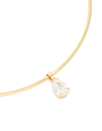 Beautifully crafted gold plated torque necklace with cubic zirconia teardrop pendant close up view - link has visual effect only