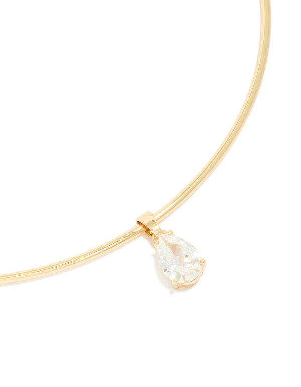 Beautifully crafted gold plated torque necklace with cubic zirconia teardrop pendant close up view