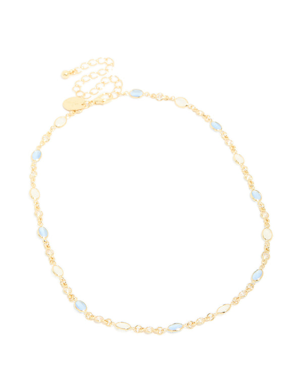 Crafted in a dainty style, this gold plated necklace features blue and white oval cubic zirconia front view