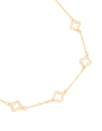 Highlighting this gold plated necklace with cubic zirconia flower charm close up view - link has visual effect only