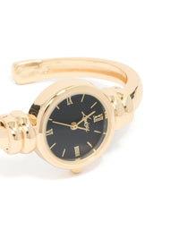 Crafted from gold plated material with black dial featuring roman numerals and round shape for women designed with bangle in casual analog style watch face detail view - link has visual effect only