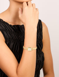 Showcasing a dainty gold Egyptian link mini watch design, white dial, rectangle shape & number display, casual analog style, featuring a link band on wrist view - link has visual effect only
