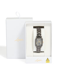 Presenting a black coated metal rectangle roman numeral watch with gold numerals, analog display, link band, and formal styling case detail view - link has visual effect only
