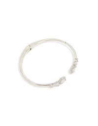 Showcasing a silver cubic zirconia circle hinged bangle front view - link has visual effect only