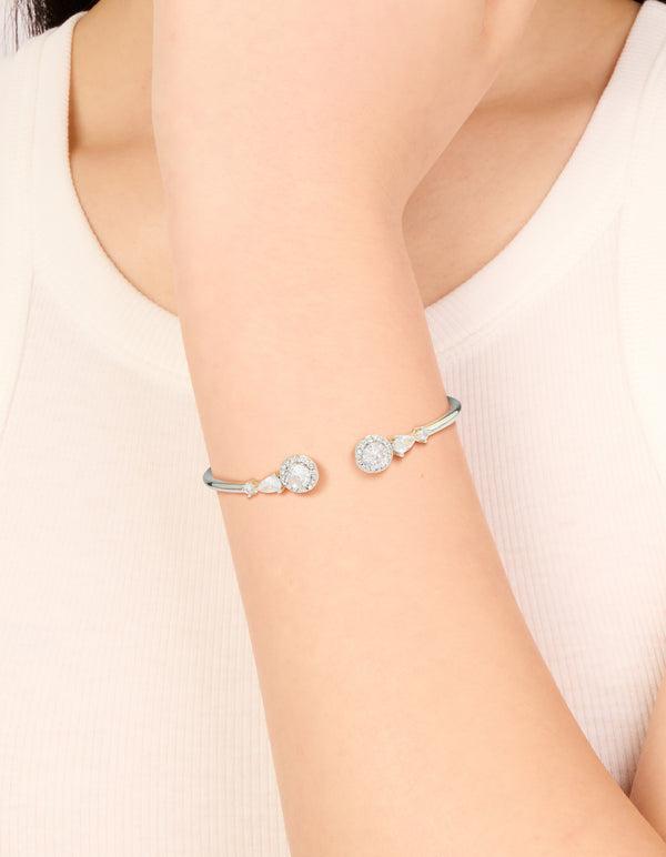 Beautifully designed silver cubic zirconia circle hinged bangle accents on wrist view
