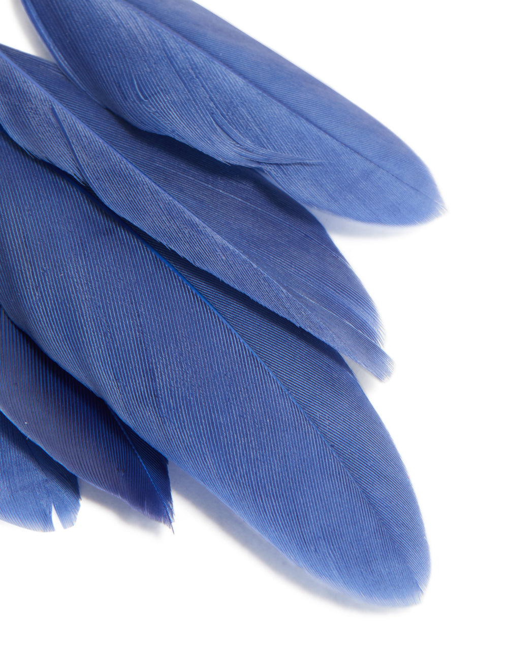 Crafted with statement dreamcatcher design, the earrings features beads, charms, and dark blue feathers in a gold finish close up view