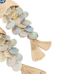 Elegant gold evil eye fish drop earrings with animal and ocean inspired charm in statement style post detail view - link has visual effect only