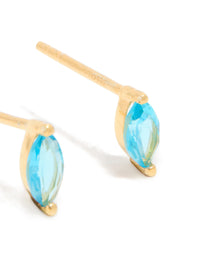 Highlighting the craftsmanship of blue marquise cubic zirconia earrings with gold plated sterling silver posts and engraved detail view - link has visual effect only