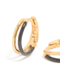 Featuring gold plated sterling silver and black enamel double hoop earrings close up view - link has visual effect only