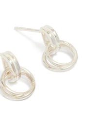 Crafted from sterling silver, these doorknocker stud earrings showcase interconnected rings and post closure detail view - link has visual effect only