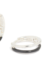 Showcasing statement hoop earrings in sterling silver with black enamel and stud closure post detail view - link has visual effect only
