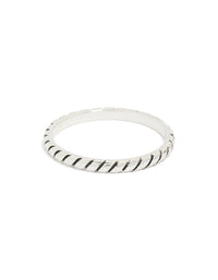 Highlighting a textured sterling silver statement ring with black enamel detailing close up view - link has visual effect only