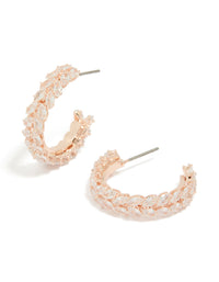Showcasing leaf-adorned medium hoop earrings in rose gold plated finish with cubic zirconia stones front view - link has visual effect only