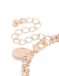 Crafted in rose gold plated material, is this diamante fireball bracelet closure detail view - link has visual effect only