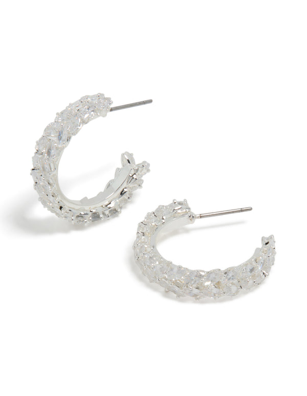 Presenting medium leaf hoop earrings featuring cubic zirconia in silver plated finish front view