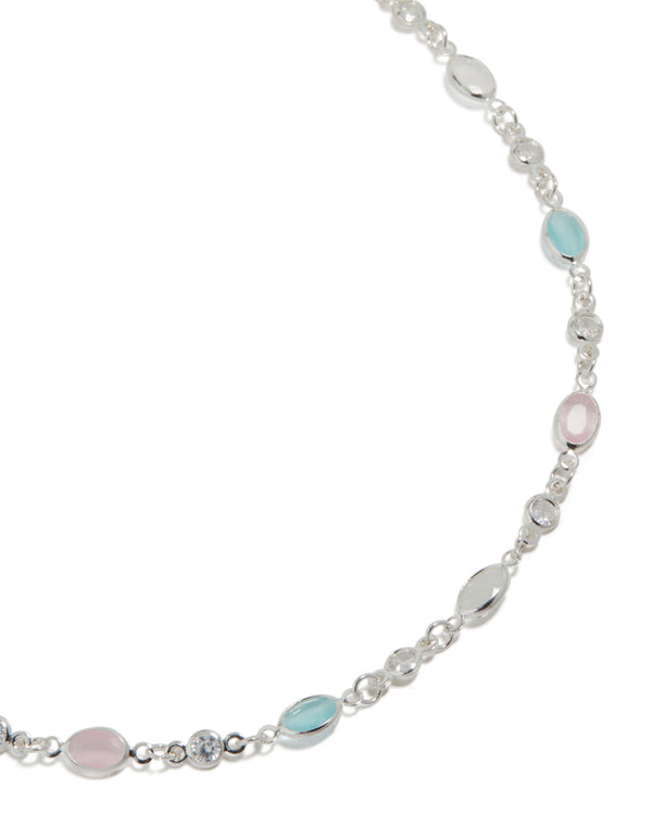 Showcasing a pink and blue cubic zirconia mixed oval necklace crafted from silver plated material close up view