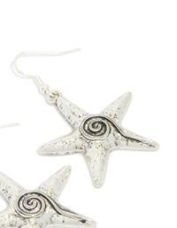 Stunning antique silver swirl starfish hook earrings showcasing ocean detailed design in a post detail view - link has visual effect only