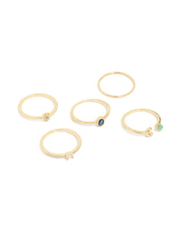 Five delicate gold plated celestial rings featuring moon, star, and cubic zirconia in blue and aquamarine front view - link has visual effect only