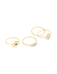 Featuring a gold-plated cubic zirconia evil eye and hamsa hand rings 4-pack with celestial sun motifs, crystal accents, and statement-style design, front view - link has visual effect only