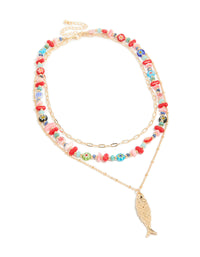 Discover a gold fish pendant and multicoloured beaded layered necklace featuring floral and ocean features in statement style front view - link has visual effect only