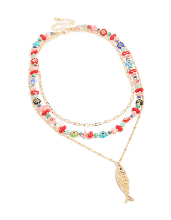 Discover a gold fish pendant and multicoloured beaded layered necklace featuring floral and ocean features in statement style front view