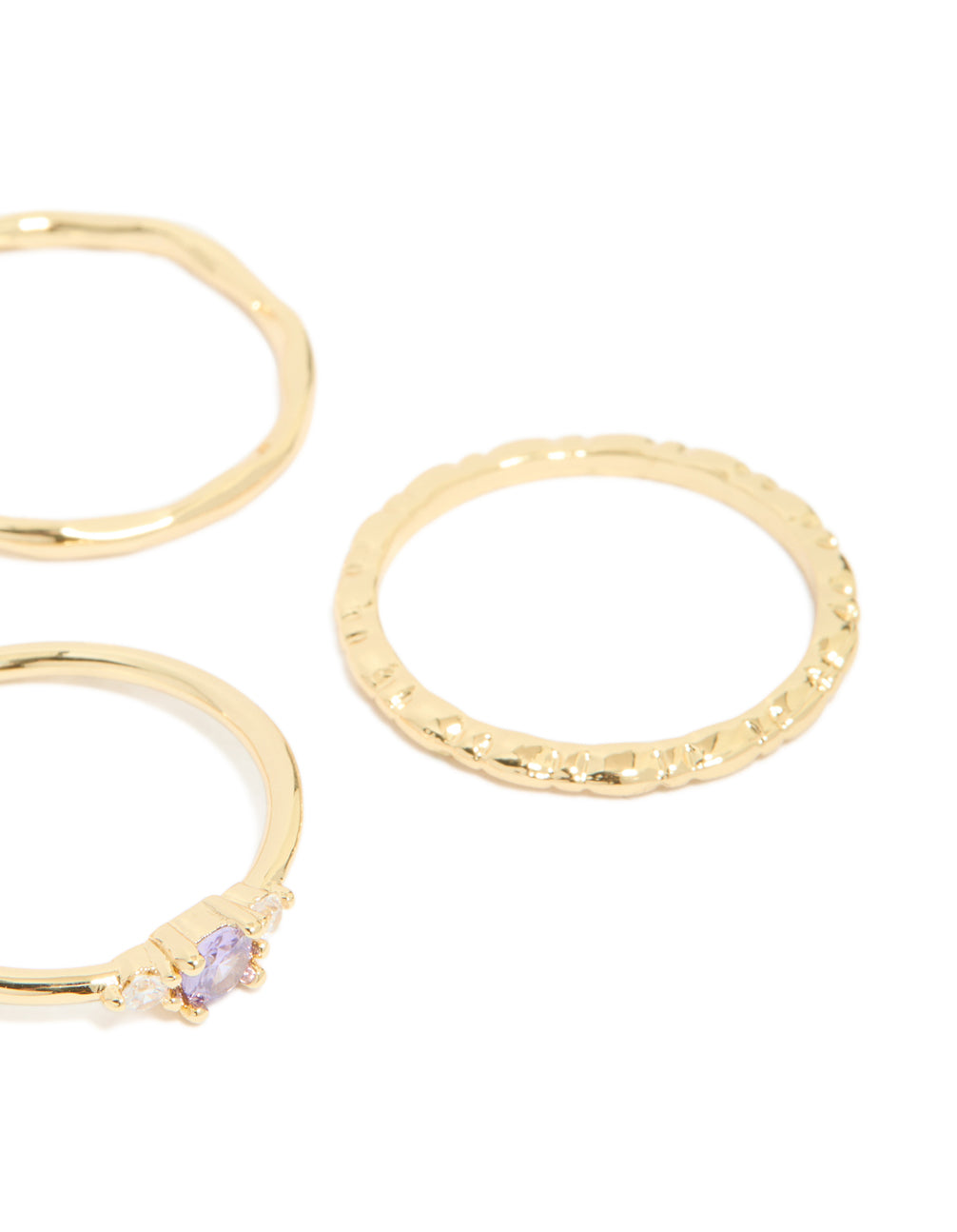 Crafted from gold plated material, aqua cubic zirconia rings 5-pack featuring stackable crystal charm design side detail view