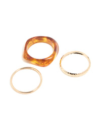 Discover gold and brown organic acrylic bangle pack with orange tones bangle front view - link has visual effect only
