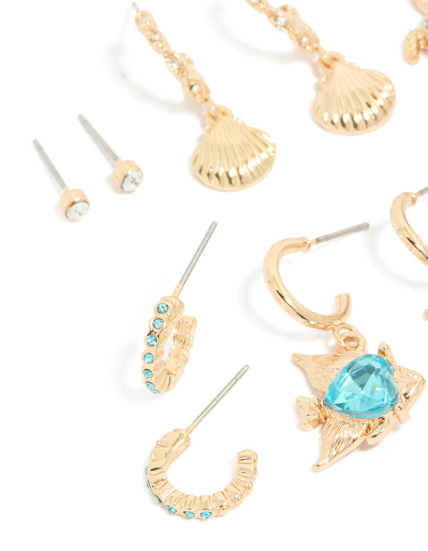 Presenting a gold aqua diamante stingray and sea life earrings 6-pack with heart and ocean shell turquoise details close up view