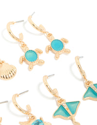 Crafted from gold aqua diamante stingray and sea life earrings 6-pack featuring heart and ocean shell with turquoise accents post detail view - link has visual effect only