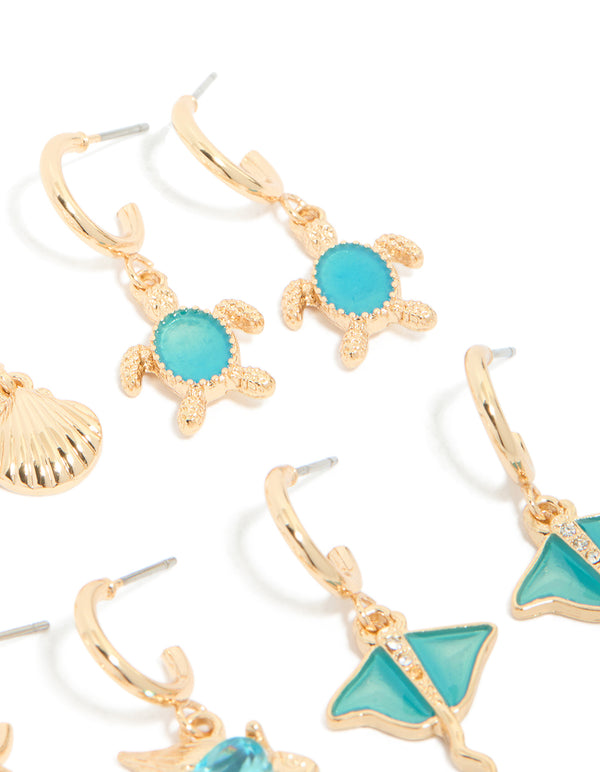 Crafted from gold aqua diamante stingray and sea life earrings 6-pack featuring heart and ocean shell with turquoise accents post detail view