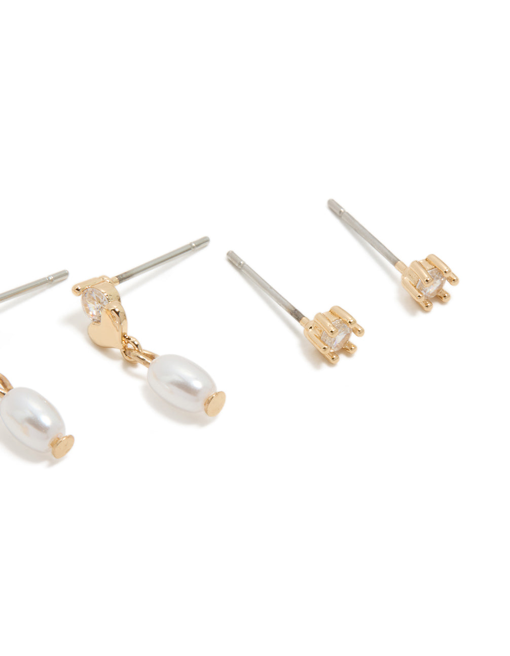 Exquisitely crafted gold cubic zirconia and pearl stud earrings 3-pack with heart post detail view