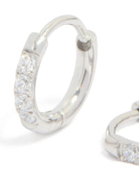 Featuring kids surgical steel sleeper earrings with cubic zirconia in silver close up view - link has visual effect only