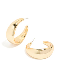 Showcasing chunky hoop earrings in gold front view - link has visual effect only