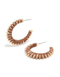 Featuring textured lined brown hoop earrings with gold closure front view - link has visual effect only