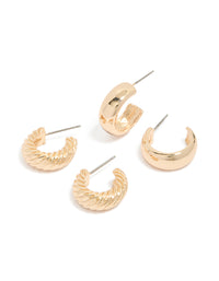 Showcasing gold plain and twisted hoop earrings in a 2-pack front view - link has visual effect only