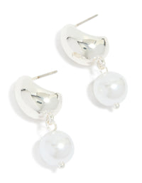 Showcasing silver pearl and bubble huggie earrings with white accents front view - link has visual effect only