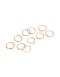 Designed with pearl and textured details in gold, this simple stackable statement ring 10-pack offers versatile styling front view - link has visual effect only