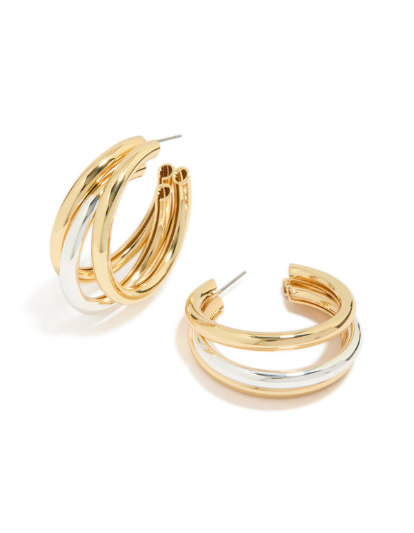Discover statement large illusion hoop earrings crafted from gold and silver plated metal front view